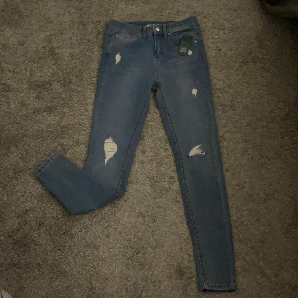 High rise blue wash skinny jeans